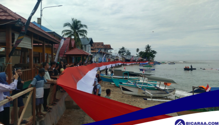 Peringati HUT RI Ke-79, Bendera Merah Putih 200 Meter Dibentangkan di Kawasan Pantai Hiu Paus Botubarani, Bone Bolango