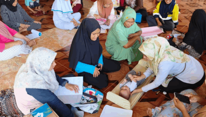 Program PMT Pani Gold Mine Dorong Penurunan Stunting di Hulawa